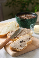 Homemade liver pate with bread and butter. Rustic style.