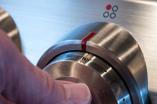 Stainless steel control knob on cooker