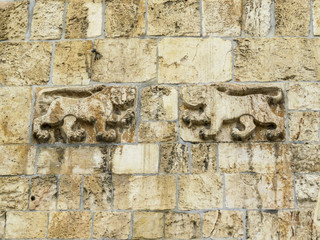 Jerusalem, Israel - Details of the Lions Gate is the start point of the Via Dolorosa.