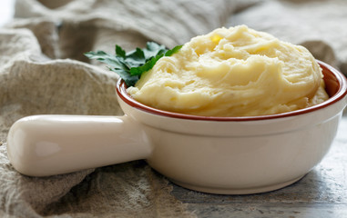 Homemade mashed potatoes with butter.