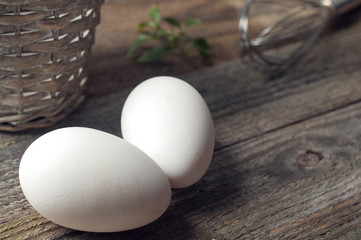 Goose eggs on wooden table