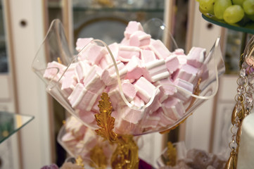 festive table setting with a variety of desserts