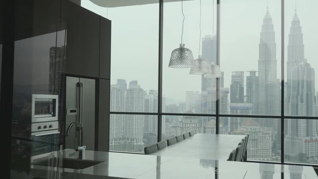 Modern nordic kitchen in loft apartment with city view. Conterporaty design concept.