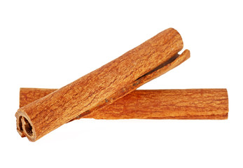Two cinnamon sticks isolated on white background