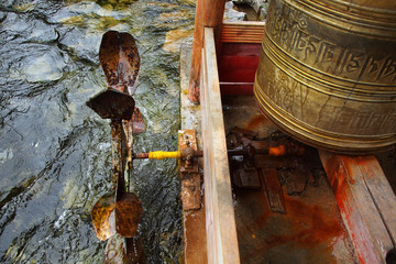 Prayer wheel in tibetan monastery
