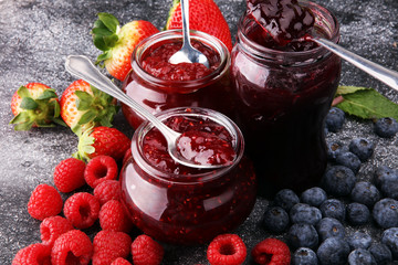assortment of jams, seasonal berries, mint and fruits