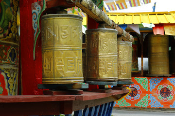 Prayer wheel in tibetan monastery