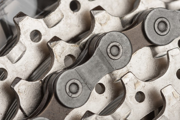 Close up chain on  9-speed cassette on rear wheel of bike, studio photo