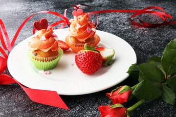 Delicious cupcake for Valentine Day. cake for Valentines day with chocolate and strawberries. Traditional homemade with red roses