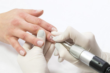 The process of the master's work in the manicure salon of female nails
