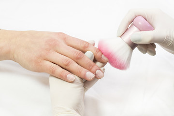 The process of the master's work in the manicure salon of female nails