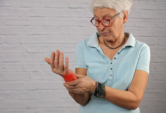 Senior Woman Suffering From Wrist Pain , Arthritis