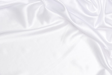 Crumpled of white satin background