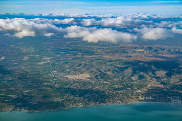 Blue ocean coast with Spanish mountain landscape aerial