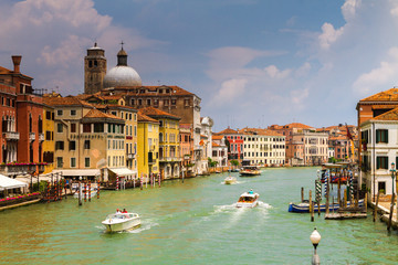 VENICE, ITALY - on May 5, 2016. View on Grand Canal, Venetian Landscape with boats and gondolas
