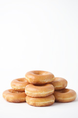 Fototapeta na wymiar Stacked Delicious Breakfast Donuts with Room for Copy