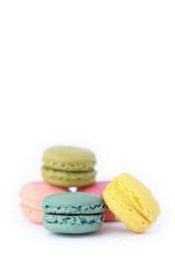 Fototapeta na wymiar Brightly Colored Stacked Up French Macarons with Copy Space