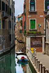 Fototapeta na wymiar VENICE, ITALY - on May 5, 2016. View on Grand Canal, Venetian Landscape with boats and gondolas