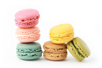 Fototapeta na wymiar Brightly Colored Stacked Up French Macarons on White