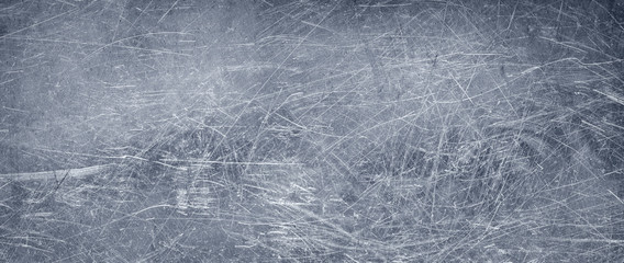 Dark metal texture, old stainless steel background with scuffs and dents