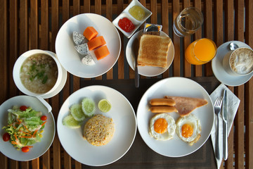many kind of food on wooden table
