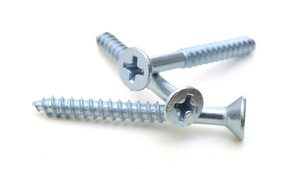 flat head zinc coated tapping screws, philips slot, isolated close up