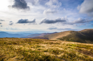 Autumn mountains in cloudly day