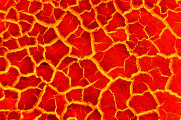 heat red cracked ground texture after eruption volcano