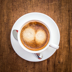 hot coffee on wooden table