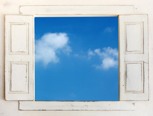 white  vintage window to see the blue sky