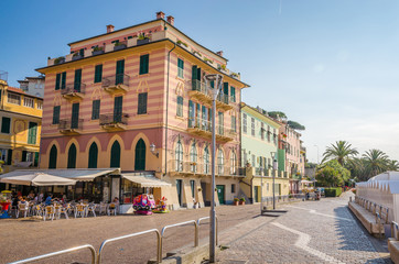Naklejka premium Narrow streets and traditional buildings of Celle Ligure, Liguria, Italy