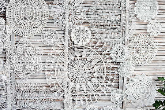 Macrame made by hands. Panel with needlework. Beautiful white patterns with your own hands.