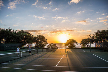 tennis court at sunset