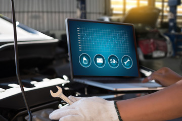 Mechanic repairing Car service concept. repair car engine