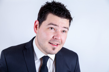 a young man in an elegant suit