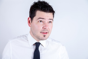 a young man in an elegant suit