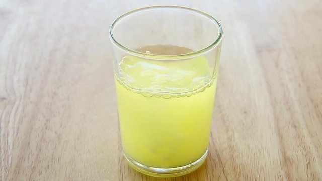 pouring  electrolytes  powder  into the water