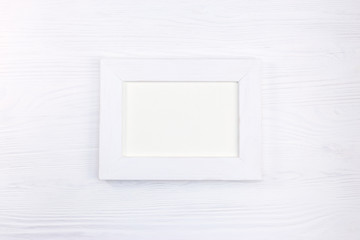 empty wooden picture frame horizontal on white background 