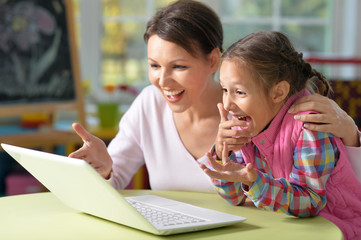 portrait of happy  mother and daughter 