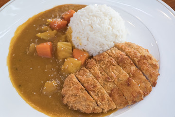  Fried pork Curry,  fried pork and curry with white rice.