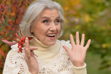 surprised woman posing with berries