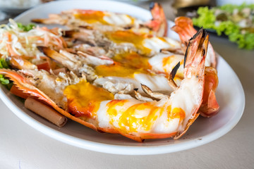 Roasted big river shrimp on the white plate , Selective focus.