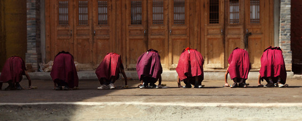  young monks doing exercice at labrang  monastery ,Xiahe,china