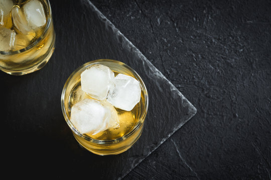 Whiskey on the rocks with lemon