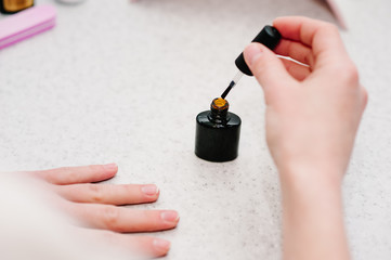 Nail primer during the procedure nail gel..Manicure arms..Good healthy nails..Nail Care.
