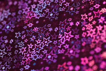 Ultraviolet holographic patterns, close up. stars