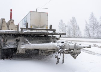 Snow covered truck in winter