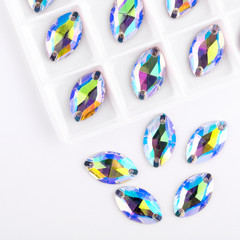 Precious stones crystal color in the pallet on a white background.