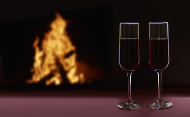 Two glasses with wine on black backdrop. Valentine's Day concept.