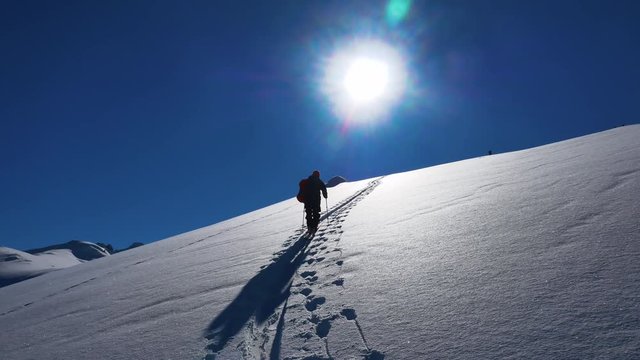 A man is rising in the mountains
